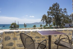 On the beach, sun loungers, beach umbrellas, windsurfing - Thirides Beach Resort (East Mani)