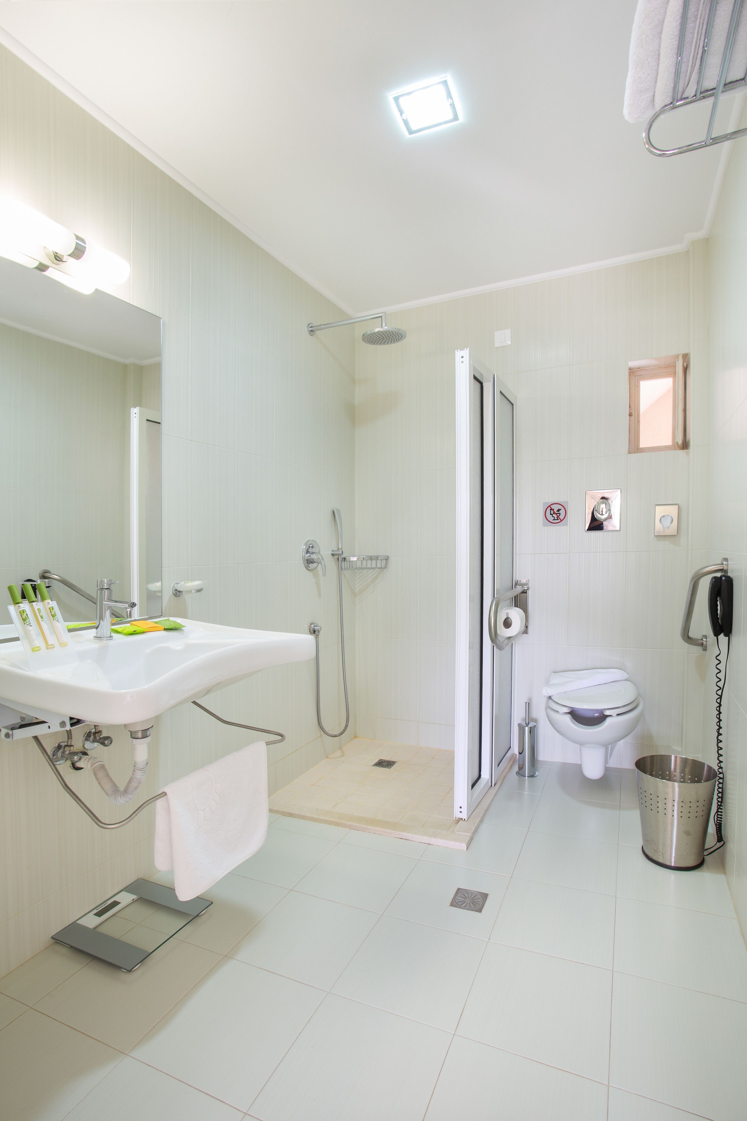 standard twin room | bathroom | designer toiletries, hair dryer, bathrobes, slippers