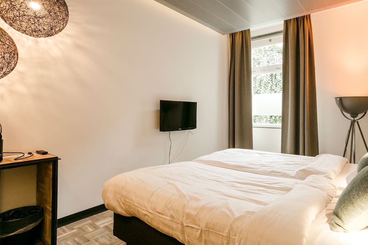 Comfort-rum | Sängtillbehör av högsta kvalitet, minibar och mörkläggningsgardiner
