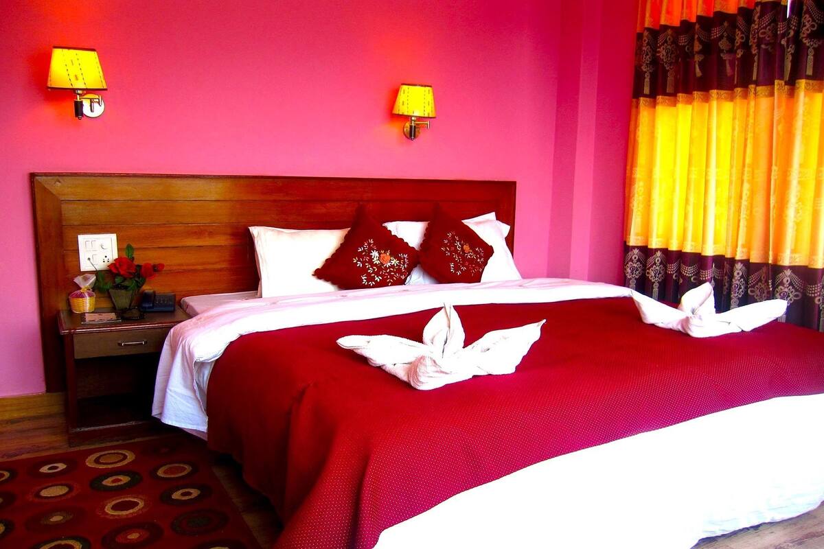 Honeymoon Room | Premium bedding, in-room safe, desk, soundproofing