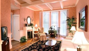 Suite, 1 King Bed with Sofa bed | Living room | TV