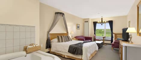 Deluxe Suite, 1 King Bed, Jetted Tub | 1 bedroom, desk, free WiFi, bed sheets