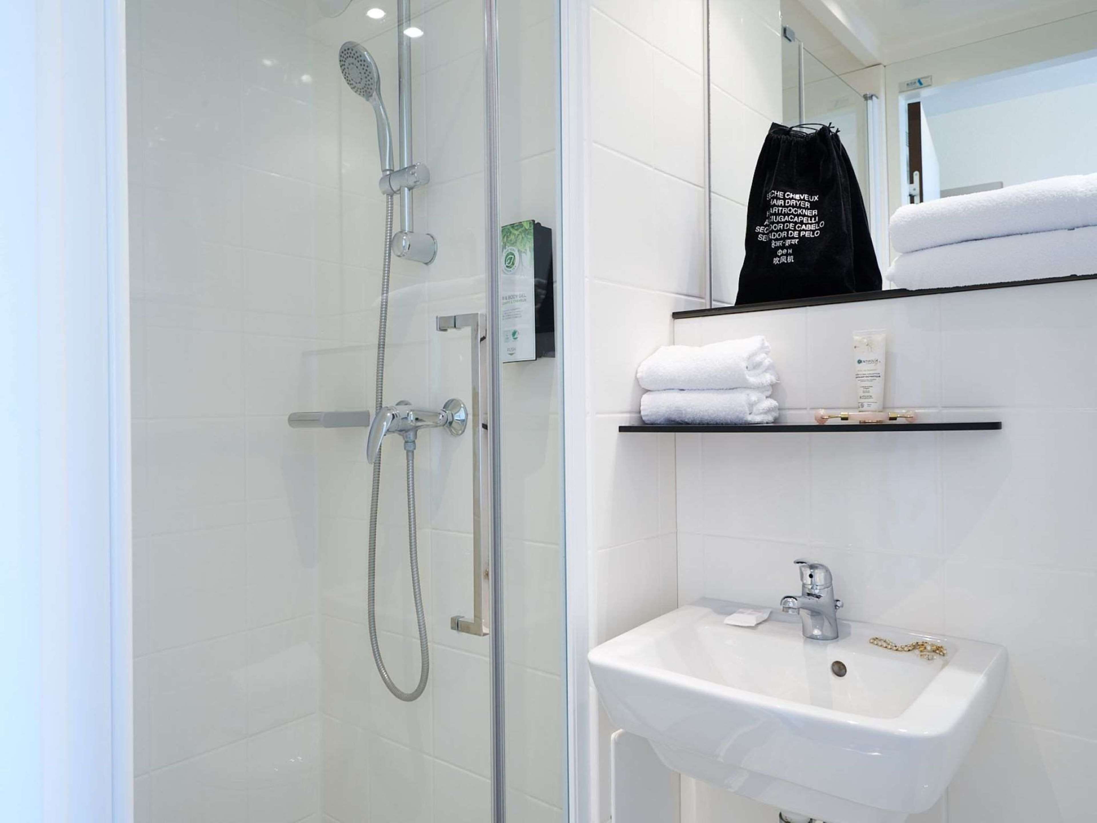 shower, eco-friendly toiletries, towels