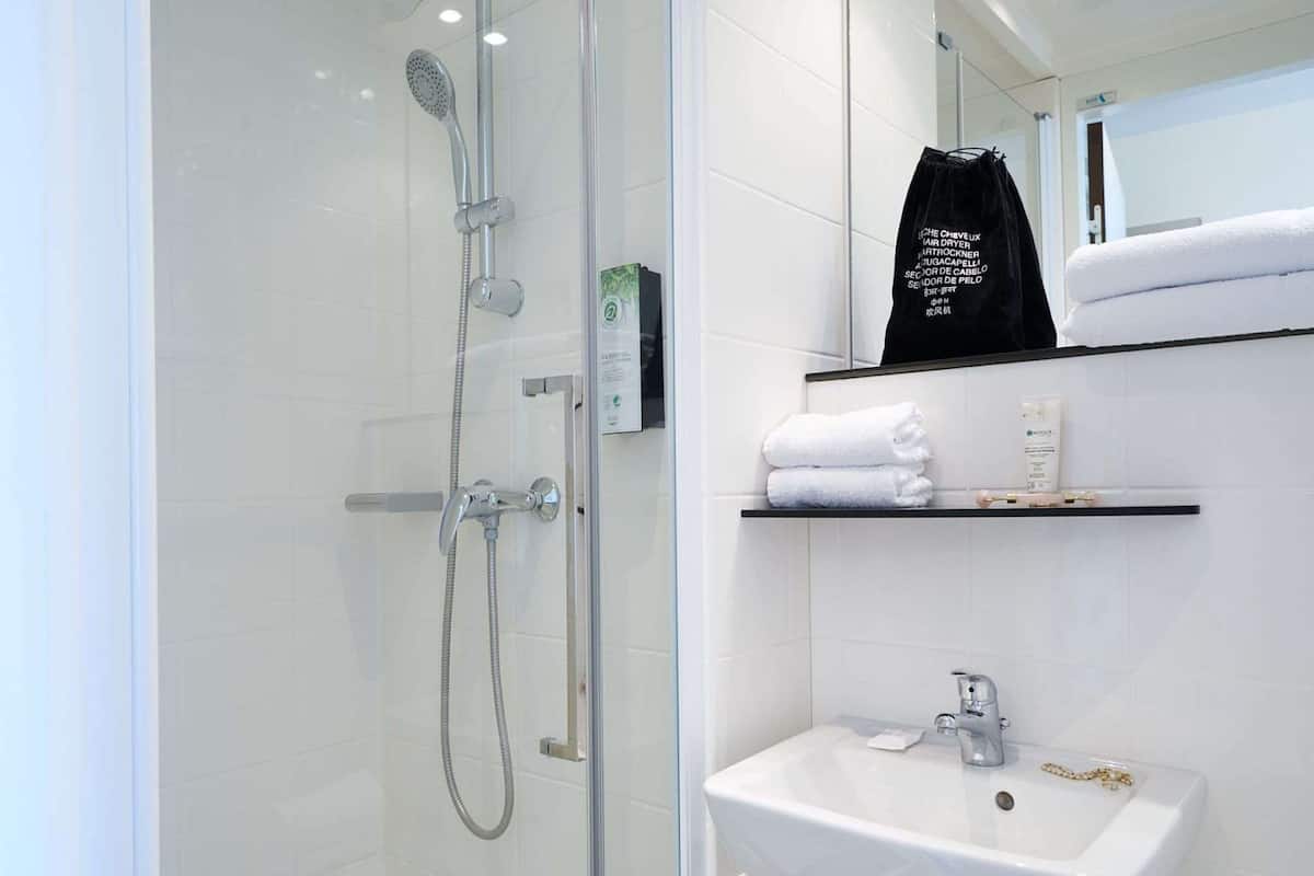 shower, eco-friendly toiletries, towels