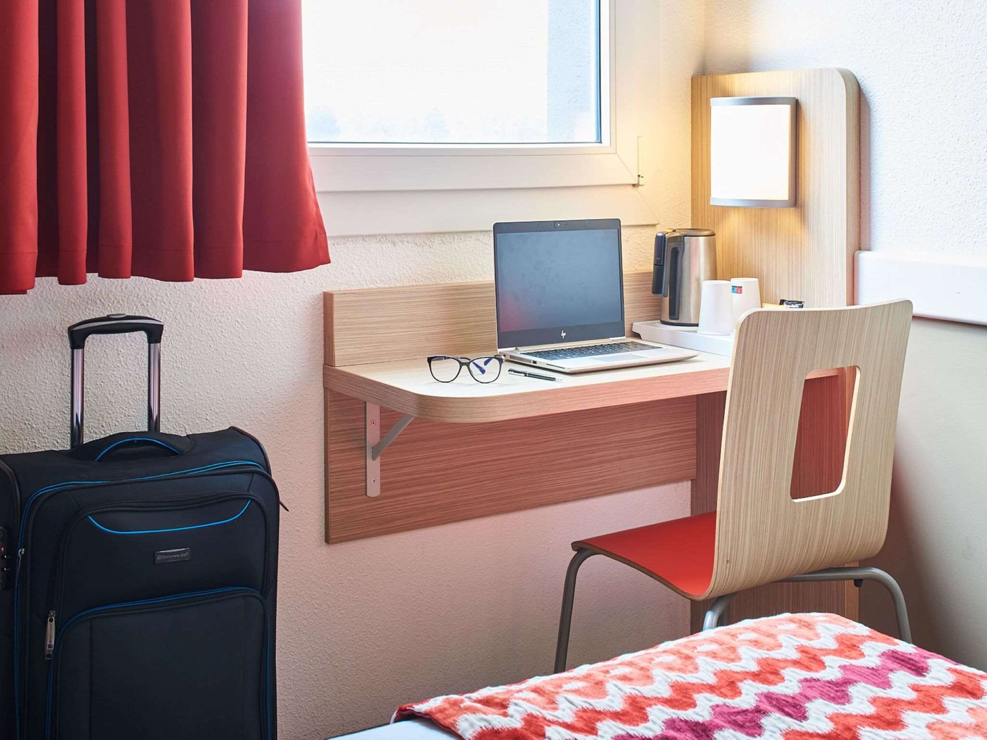 desk, blackout curtains, soundproofing, iron/ironing board