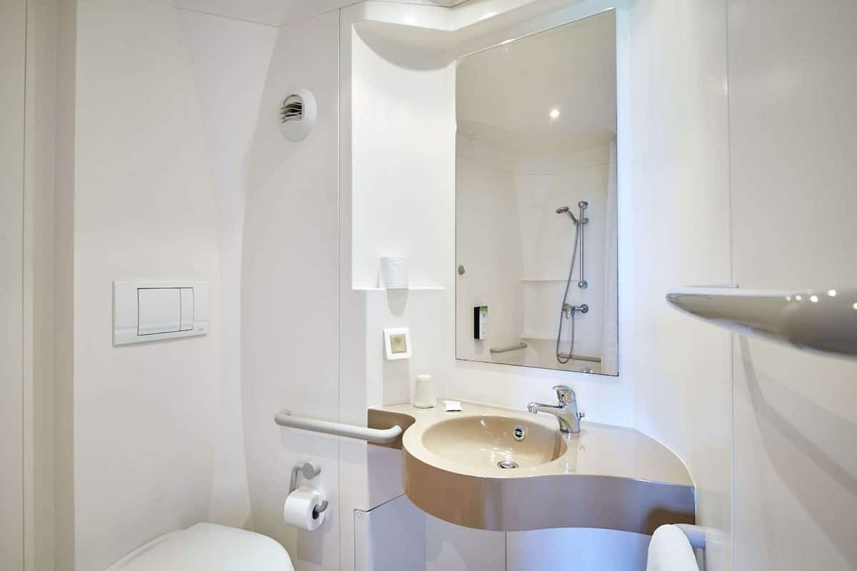 shower, eco-friendly toiletries, towels