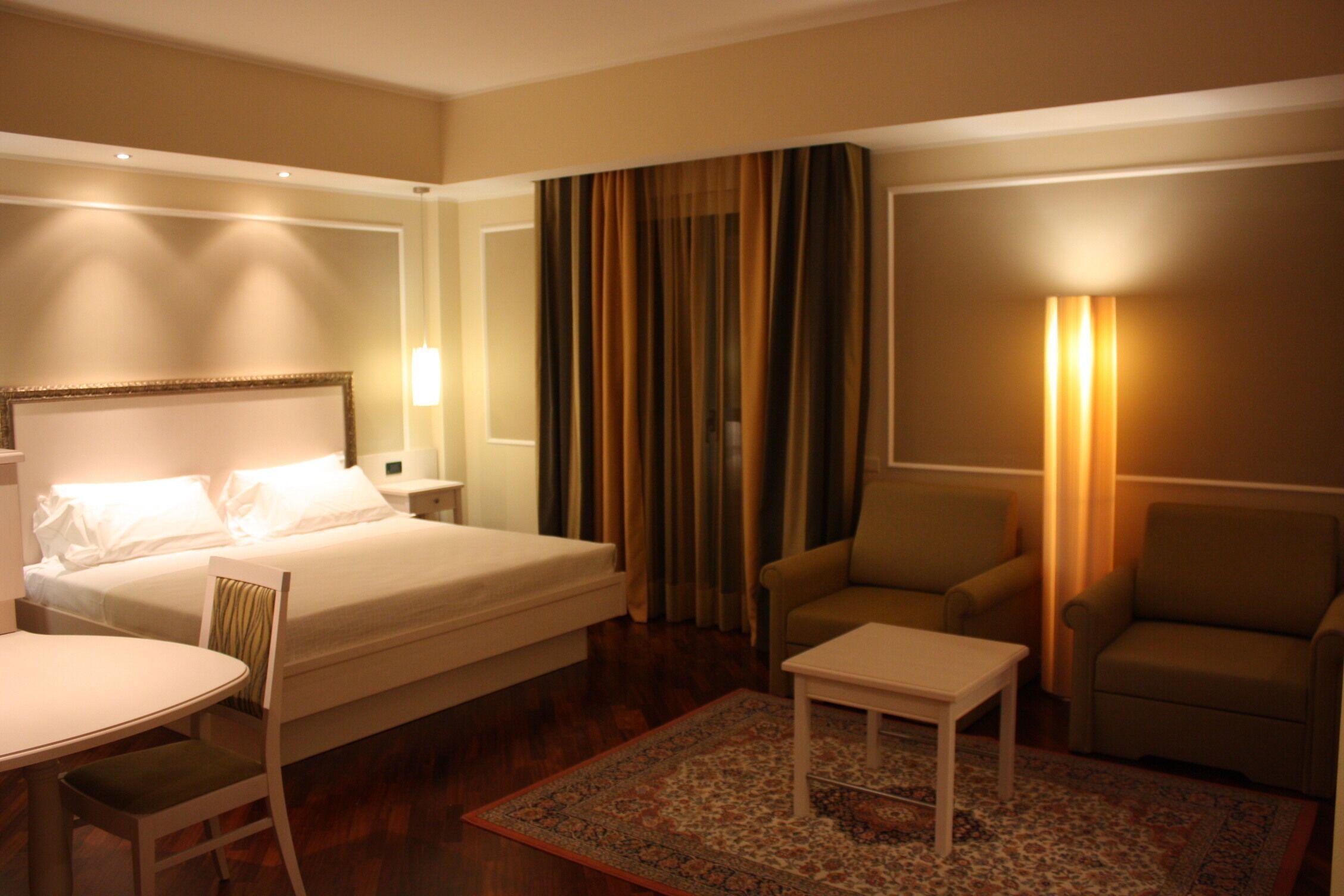 junior suite | 1 bedroom, minibar, in-room safe, desk