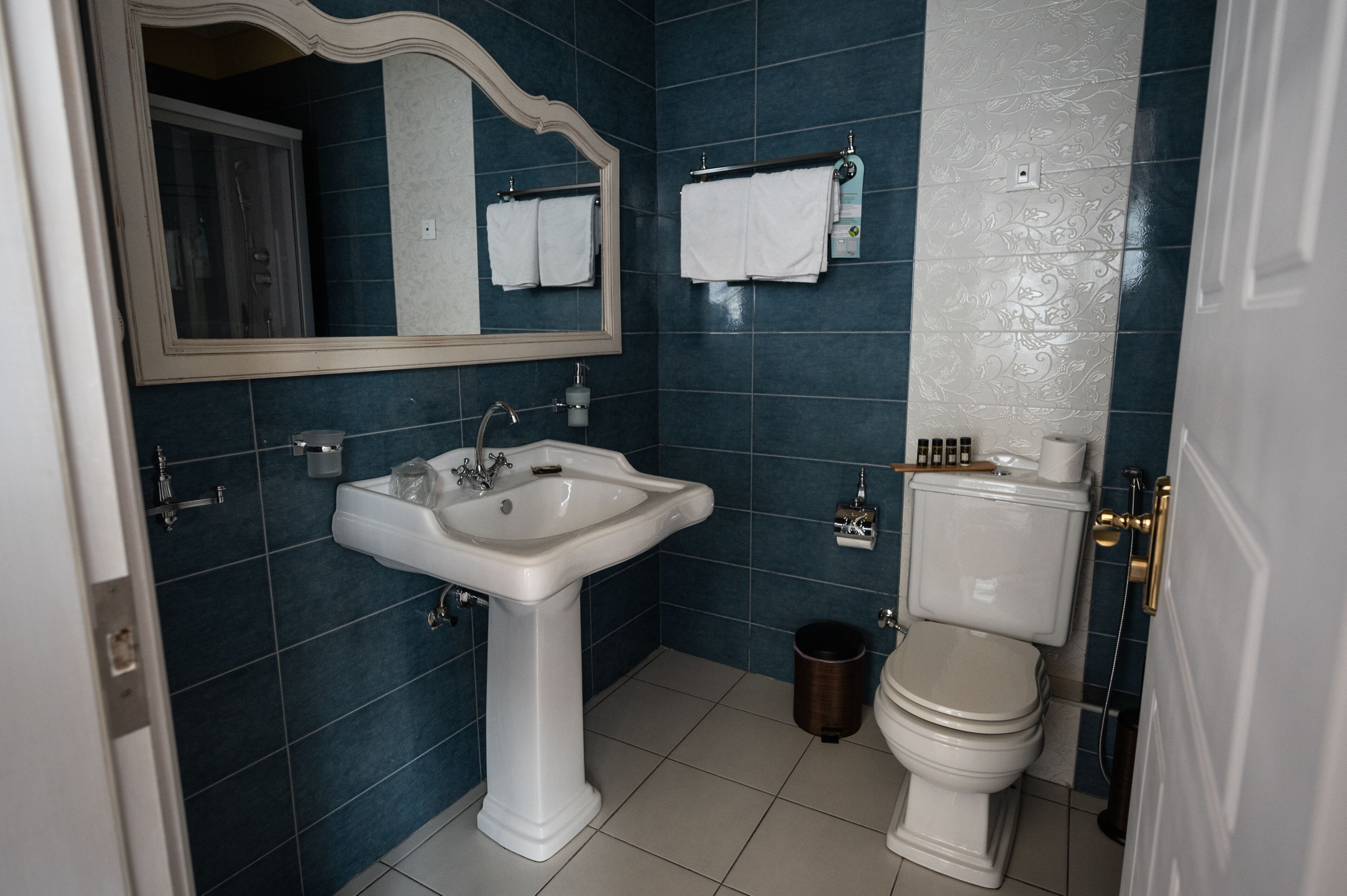 superior double room, 1 king bed, allergy friendly | bathroom | hydromassage showerhead, designer toiletries, hair dryer, slippers