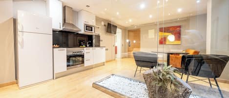 Monolocale Standard | Area soggiorno | TV