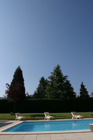 Outdoor pool, pool umbrellas, pool loungers