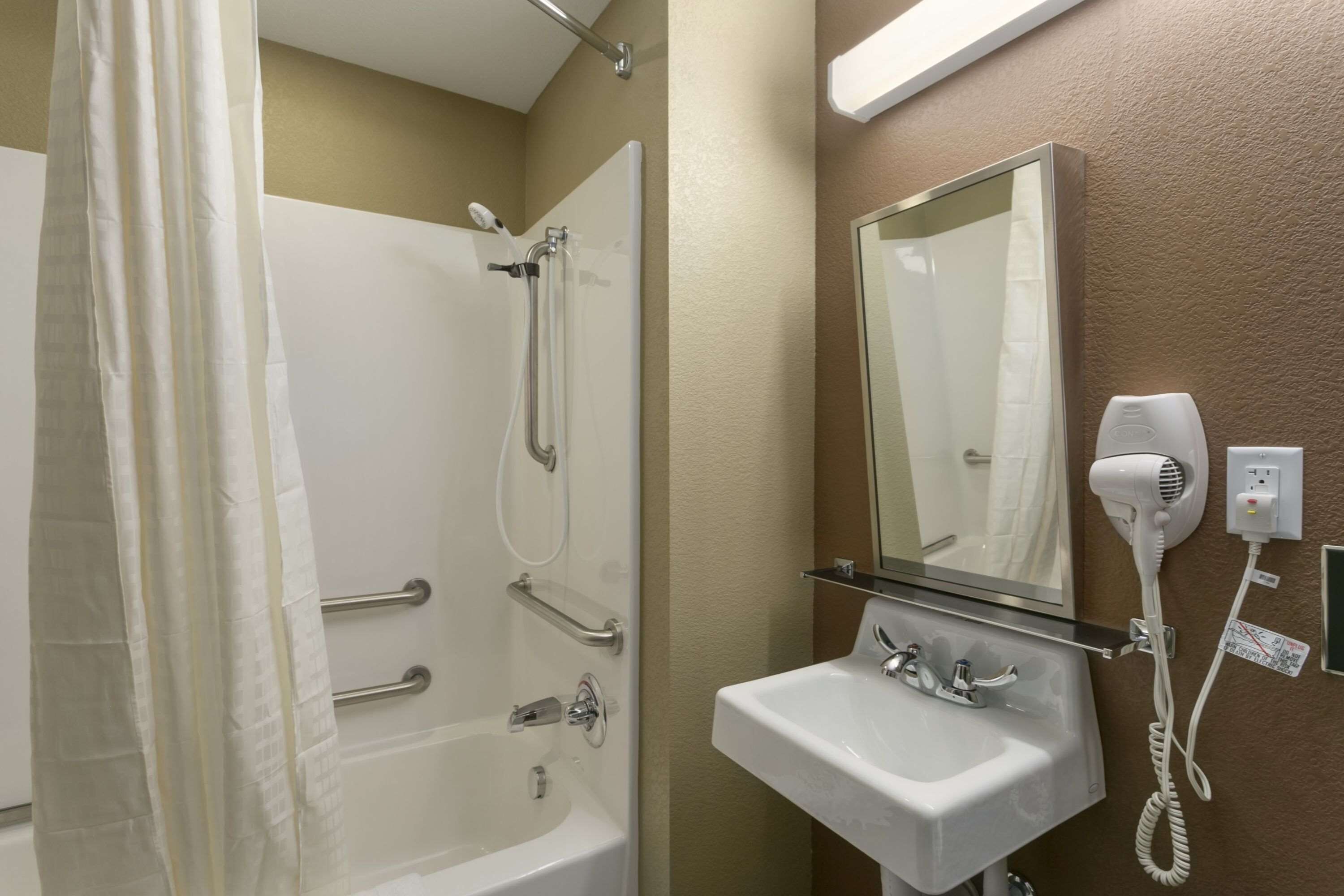 combined shower/bathtub, free toiletries, hair dryer, towels