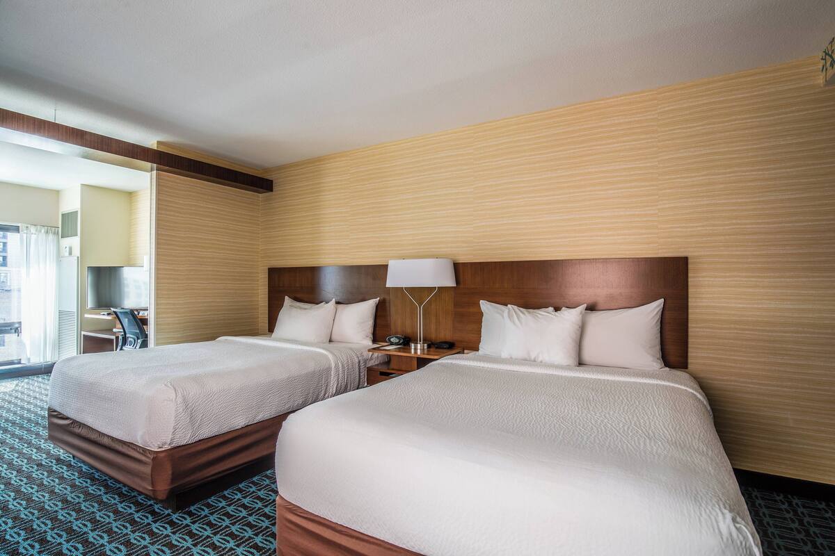 premium bedding, desk, blackout curtains, iron/ironing board