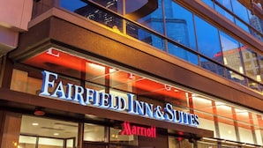 A Marriott Fairfield Inn & Suites building facade with large windows and a prominent signage. - Fairfield Inn & Suites Chicago Downtown/River North (Chicago)