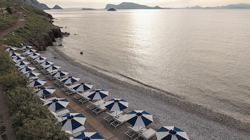 En la playa, traslado desde/hacia la playa, sillas reclinables de playa