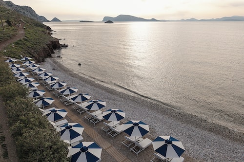 On the beach, beach shuttle, sun loungers, beach umbrellas
