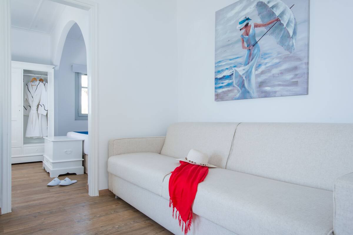 villa, sea view, beachfront | living room | flat-screen tv