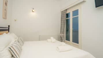 Family Apartment, Sea View | Premium bedding, pillowtop beds, blackout drapes, free WiFi