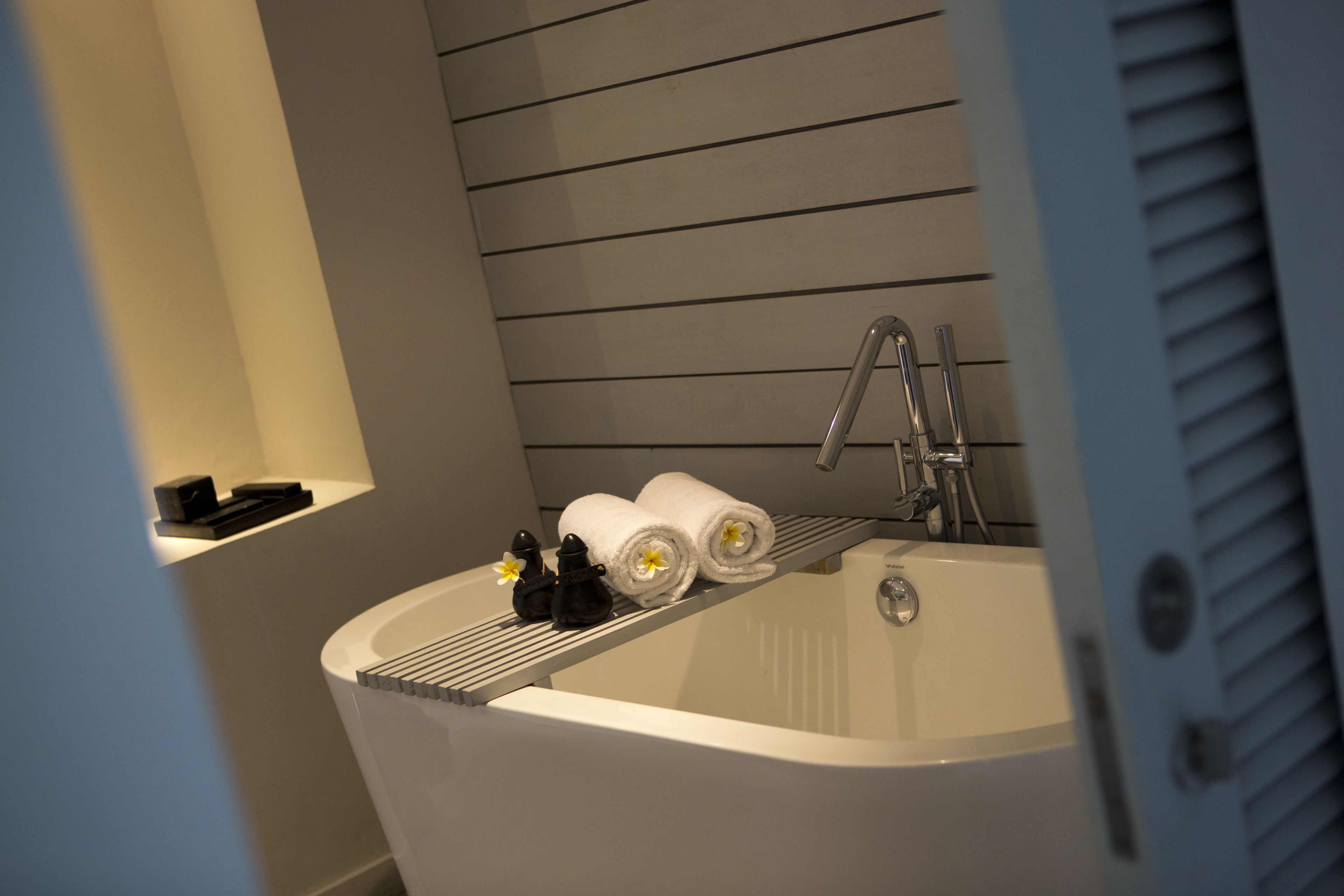 separate bathtub and shower, designer toiletries, hair dryer, bathrobes