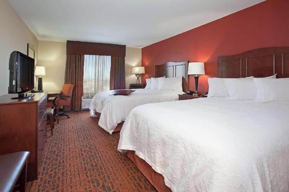 Pillowtop beds, desk, laptop workspace, blackout drapes