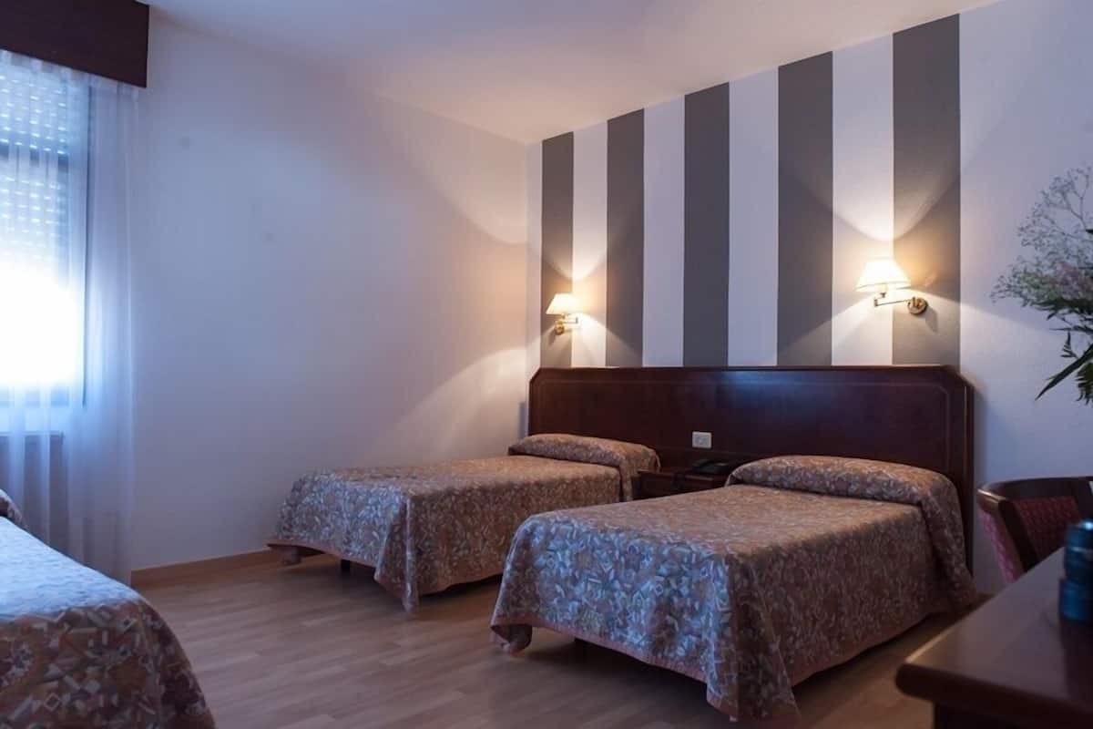 In-room safe, desk, blackout curtains, free cots/infant beds