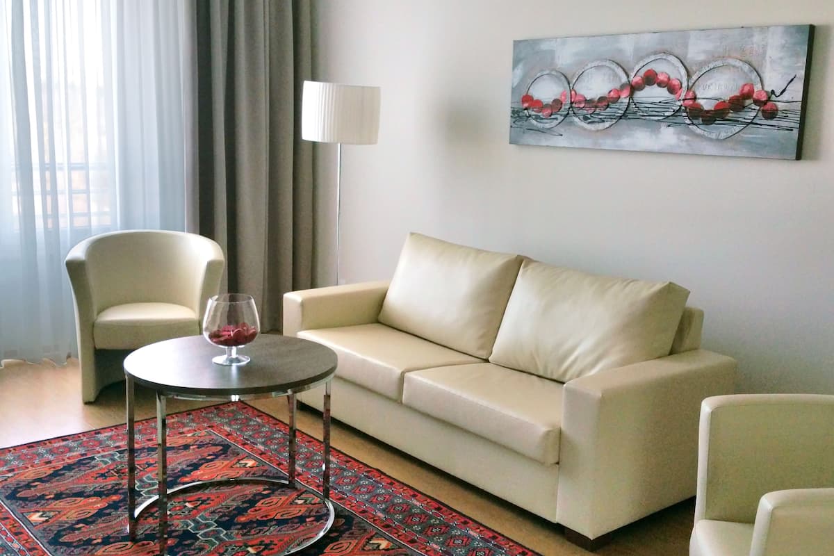 superior suite, balcony, hill view | living room | 28-inch lcd tv with satellite channels, tv