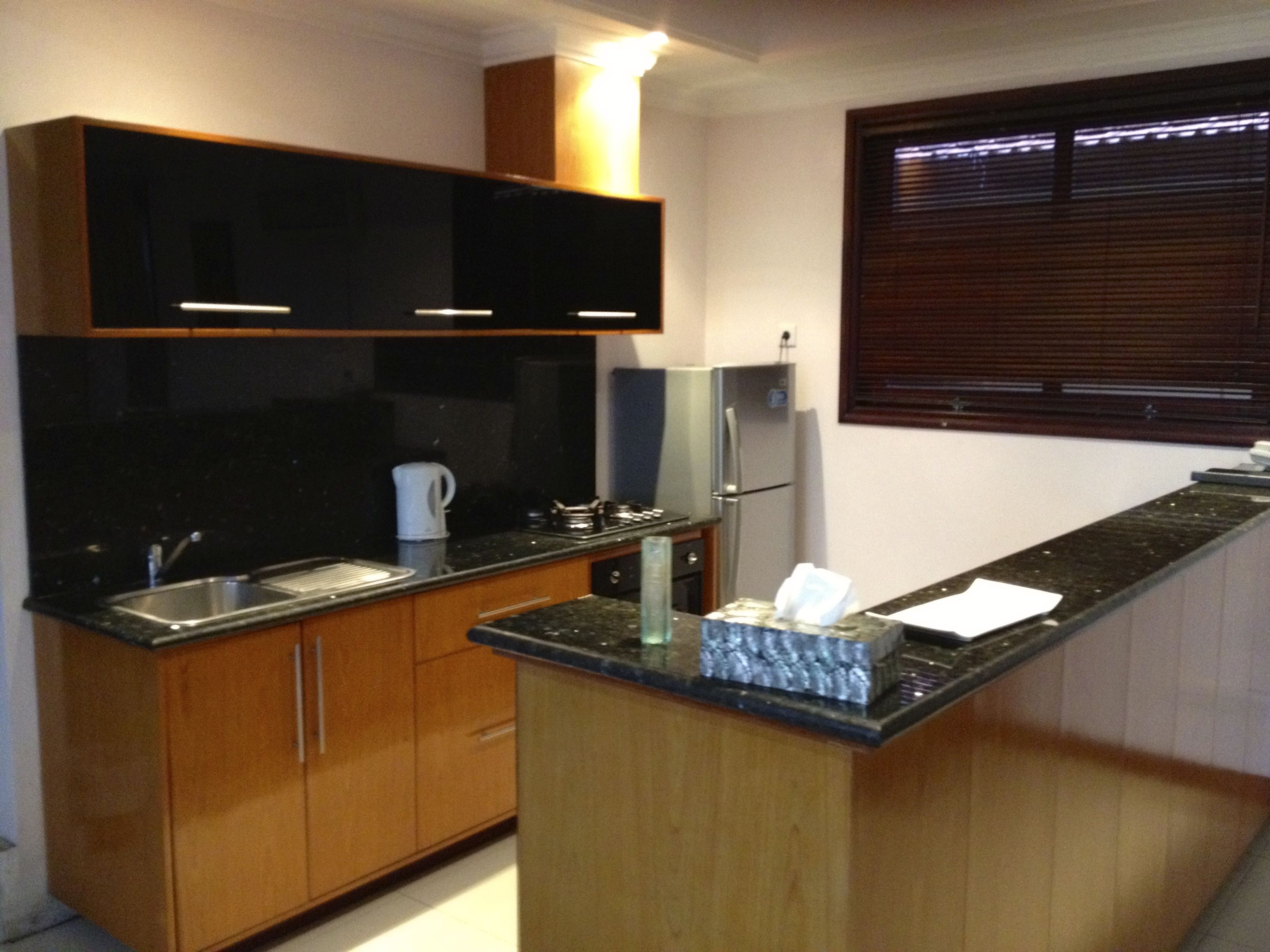 penthouse (sandat cliff edge) | private kitchen | full-sized fridge, stovetop, electric kettle, cookware/dishes/utensils