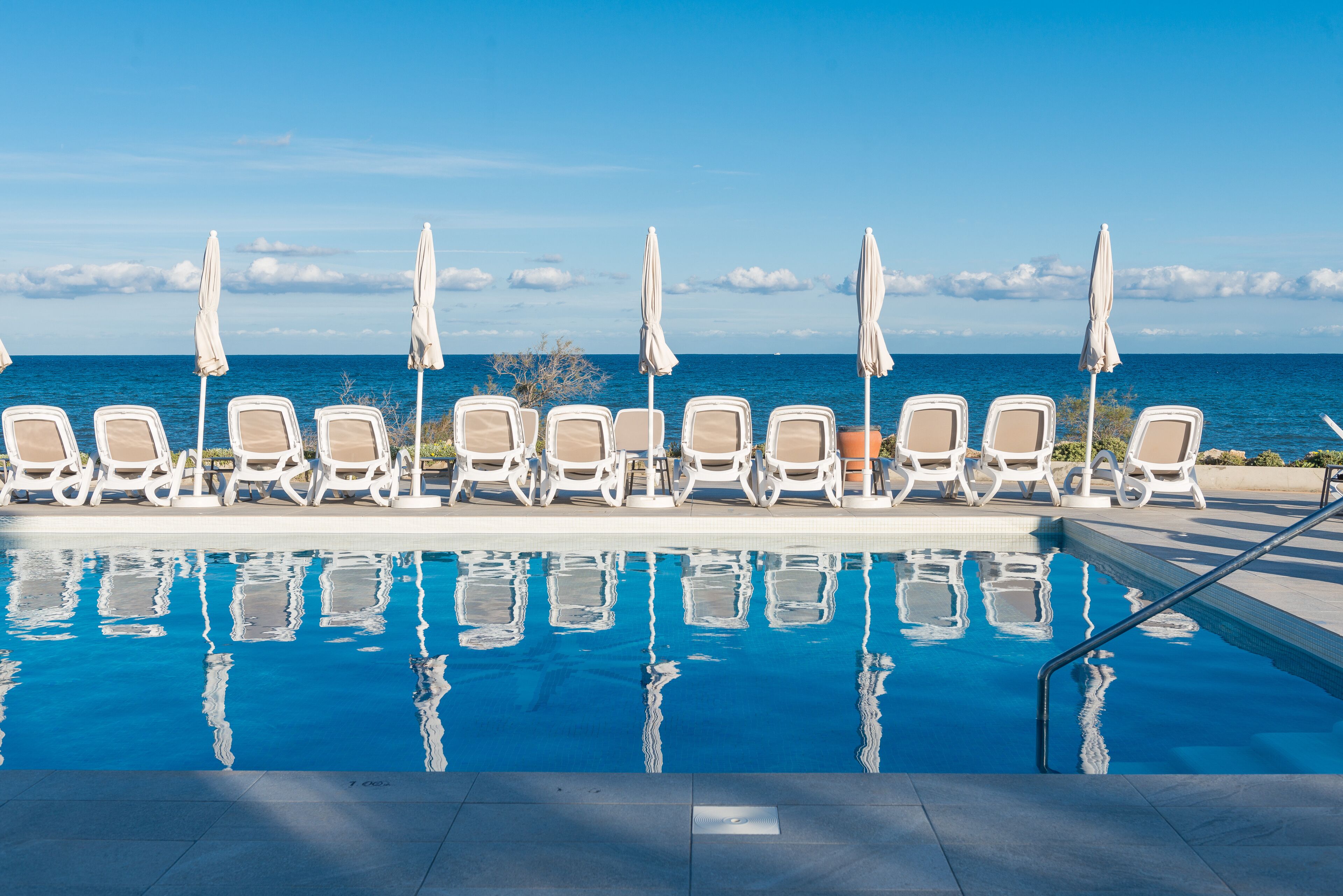 outdoor pool, pool loungers