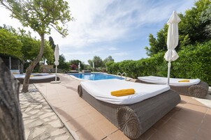 Outdoor pool, pool umbrellas, sun loungers