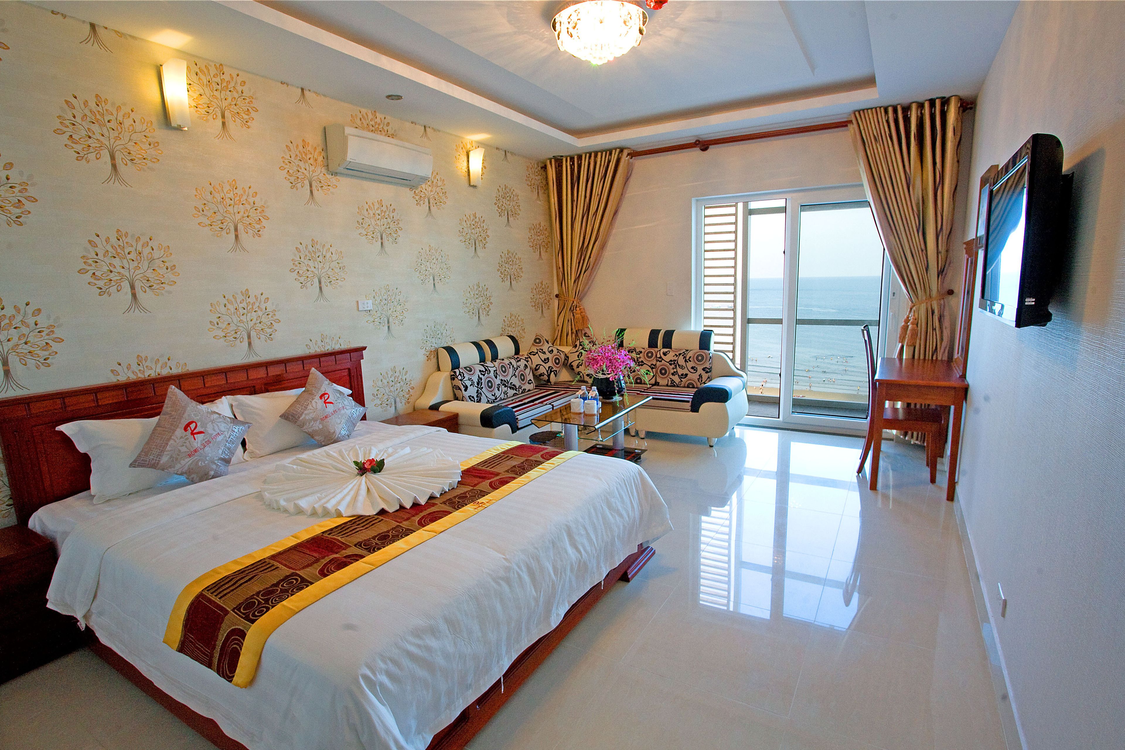 Romeliess Deluxe Room, Sea View | Minibar, in-room safe, desk, blackout drapes