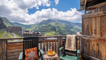 Appartement 7 personnes - 1 chambre + 1 coin nuit - Vue montagne dégagée | Terrasse/Patio