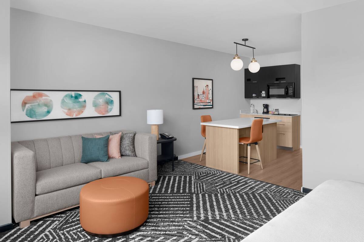 premium bedding, desk, blackout curtains, iron/ironing board