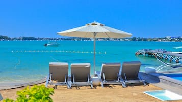 Private beach, white sand, free beach shuttle, sun-loungers