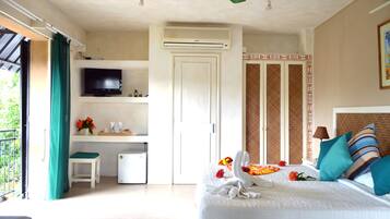 Superior Triple Room | Minibar, in-room safe, iron/ironing board, free cribs/infant beds