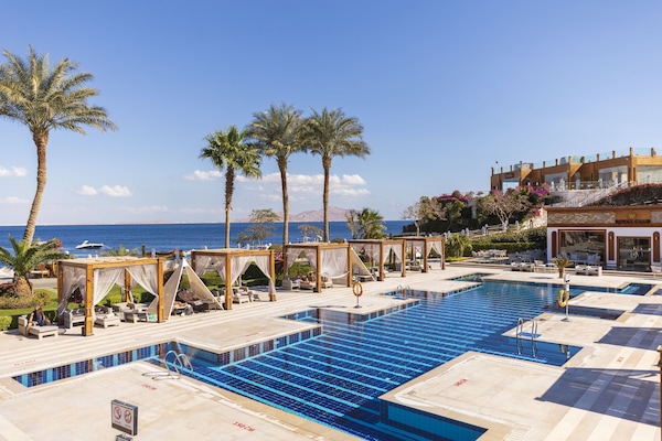 Indoor pool, 6 outdoor pools, open 6:00 AM to 5:00 PM, free cabanas