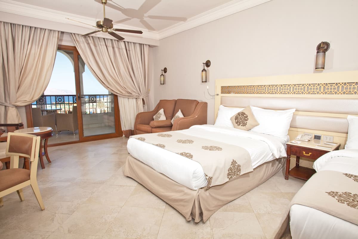 Premium bedding, pillow-top beds, free minibar items, in-room safe