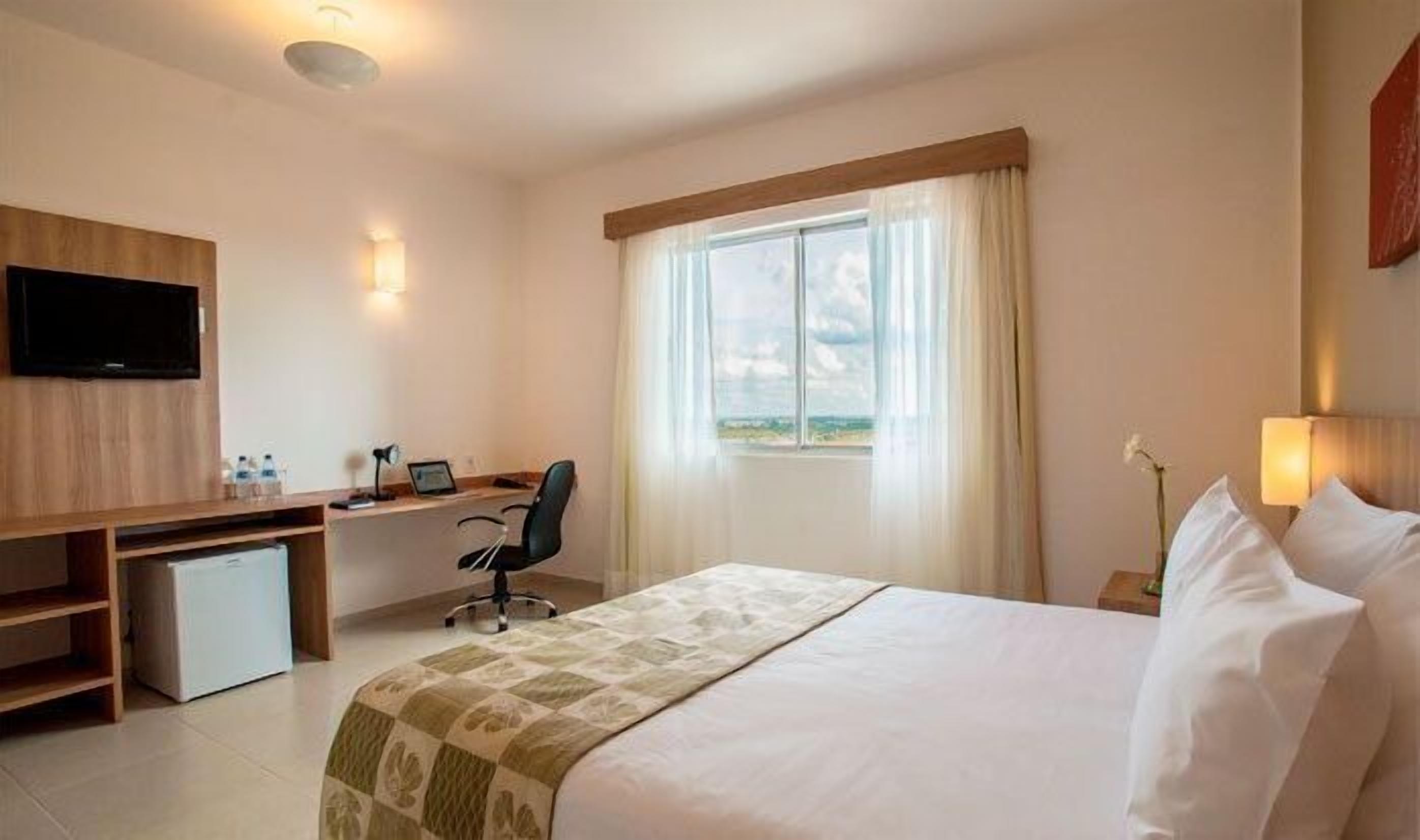 Habitación Deluxe doble | Minibar, caja fuerte, camas supletorias y wifi gratis