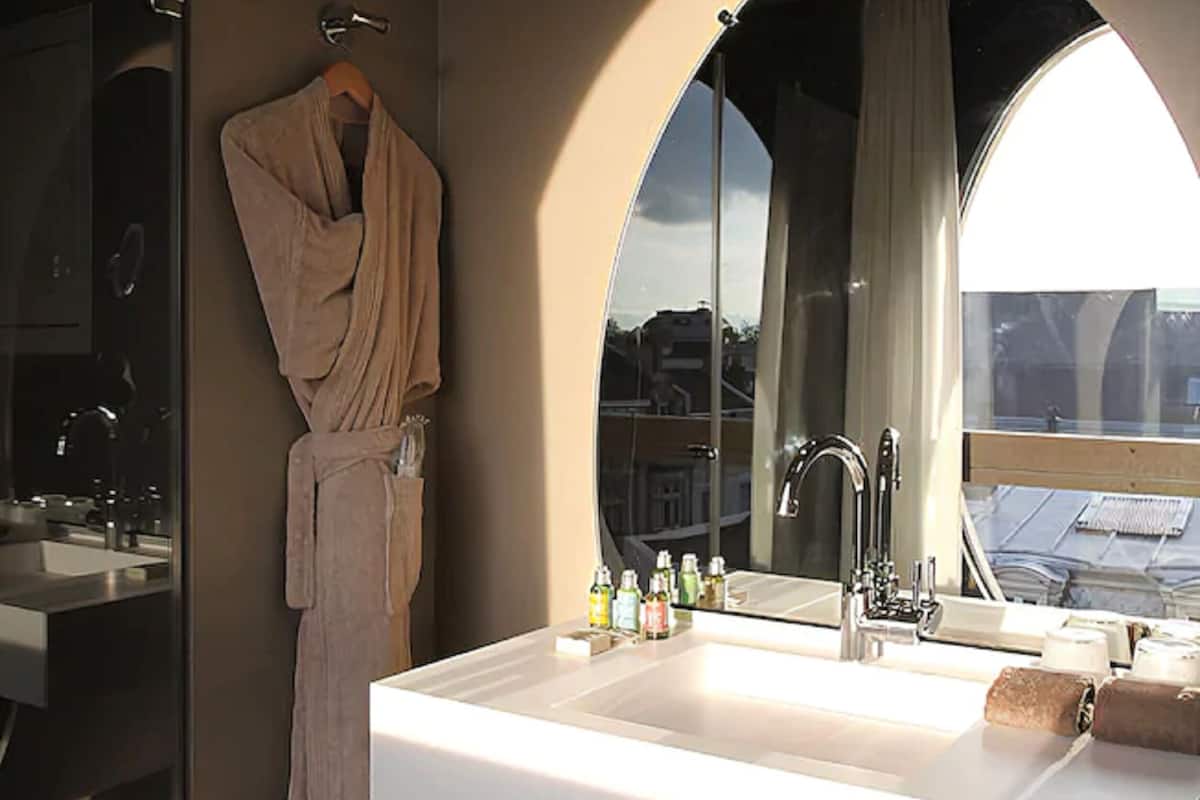 eco-friendly toiletries, hair dryer, towels, soap