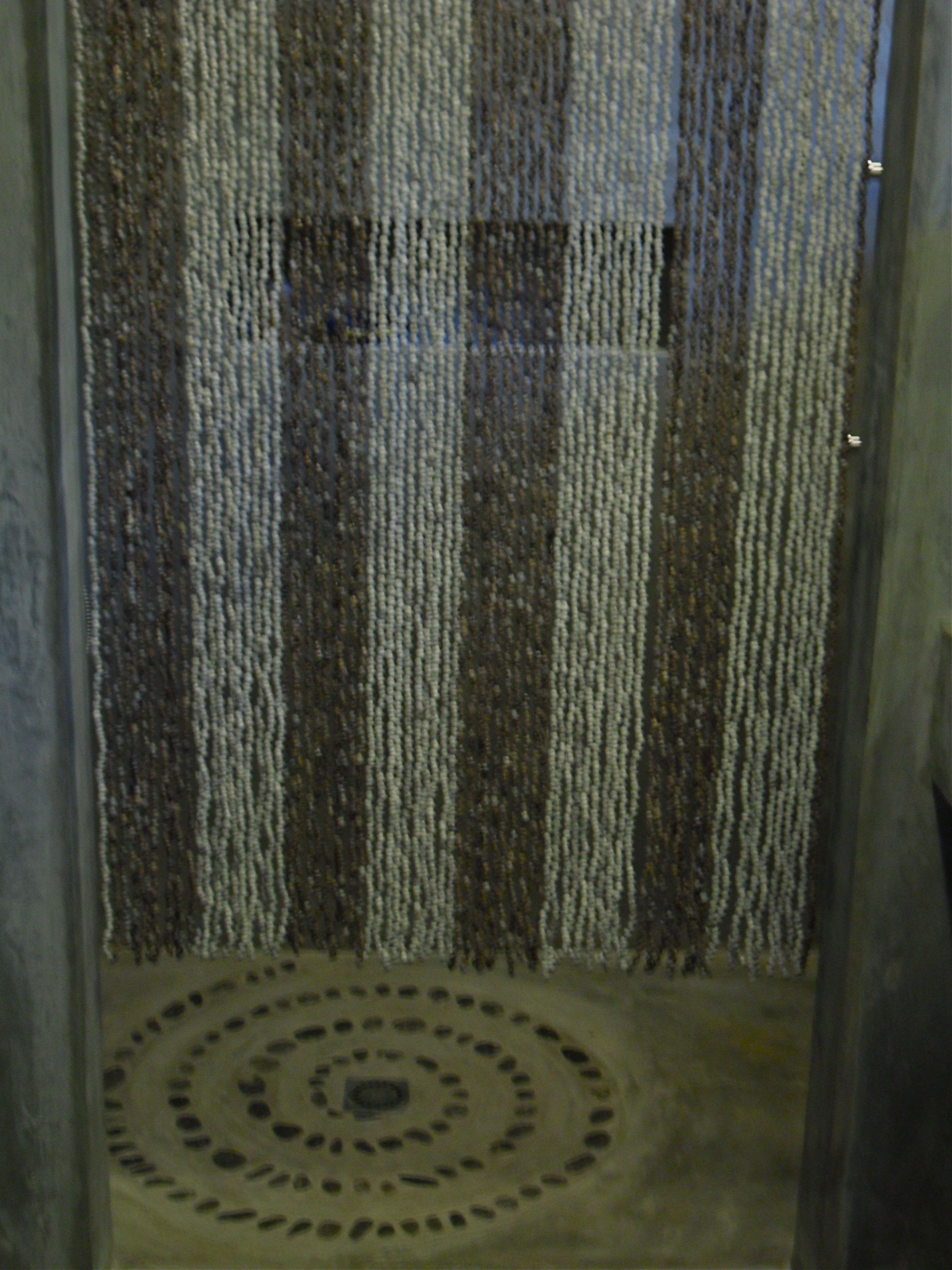 A carpeted area with a circular pattern on the floor.