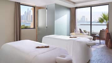 Enjoy breathtaking city views from this stylish room with two comfortable beds, a cozy seating area, and a convenient snack station.