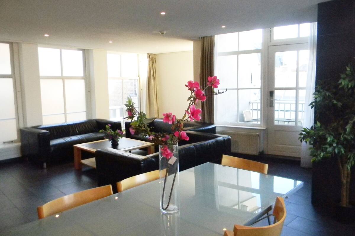 Apartment, 4 Bedrooms, Balcony | Living room | Flat-screen TV