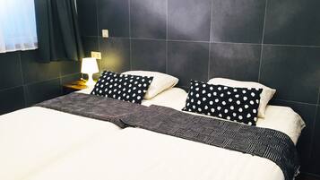 Appartement, 4 slaapkamers | Hypoallergeen beddengoed, verduisterende gordijnen, geluiddichte muren