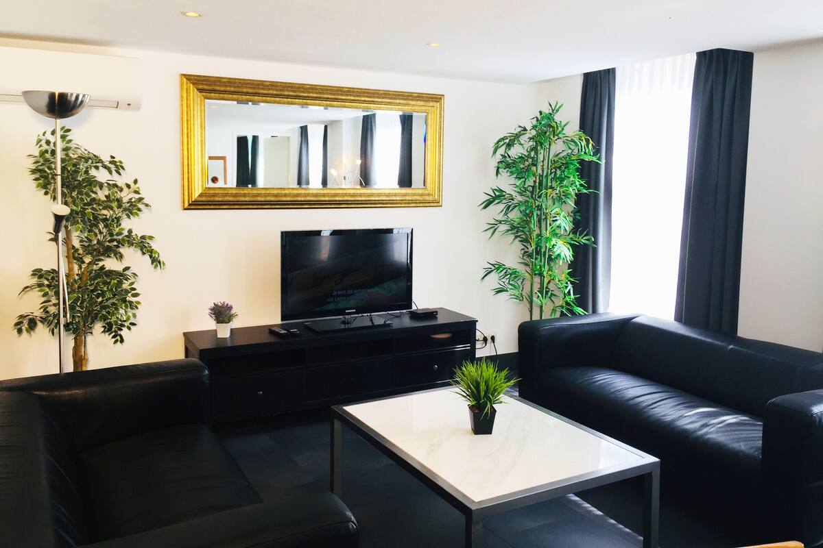 Apartment, 2 Bedrooms, Balcony (D) | Living area | Flat-screen TV