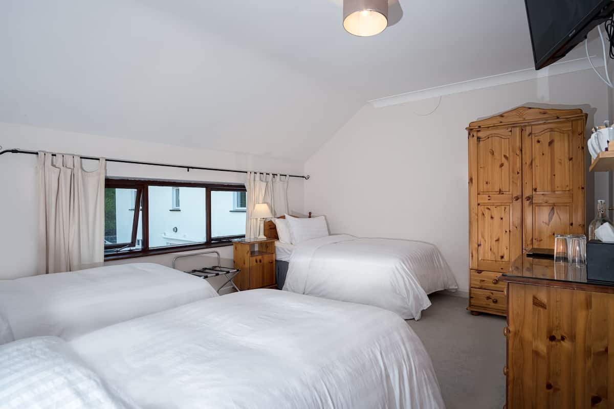 Triple Room | Egyptian cotton sheets, premium bedding, free cots/infant beds