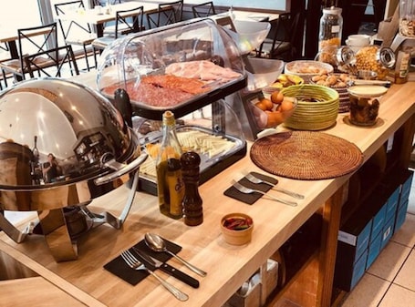 Breakfast buffet. B-aparthotel Regent