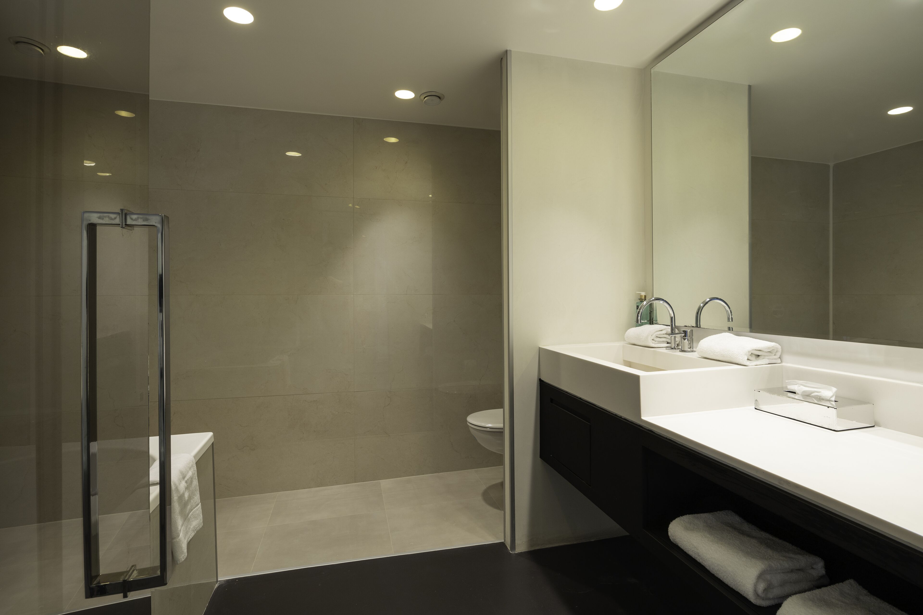 rainfall showerhead, designer toiletries, hair dryer, towels