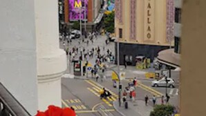 A busy urban street with a prominent building labeled "CALLAO" and a large digital billboard. - Main Street Madrid (Madrid)