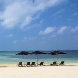 Private beach, beach umbrellas, beach towels, scuba diving