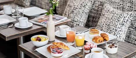 Daily buffet breakfast (EUR 14 per person)