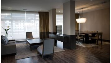 Presidential Suite | Living room | 46-inch LED TV with cable channels, TV, DVD player