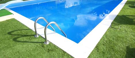 Outdoor pool, pool loungers